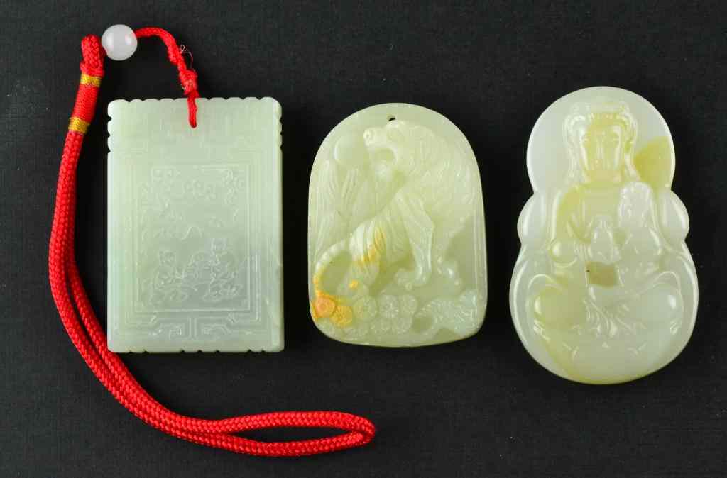 Appraisal: Chinese Carved Jade PlaquesFinely carved one to depict a Guanyin