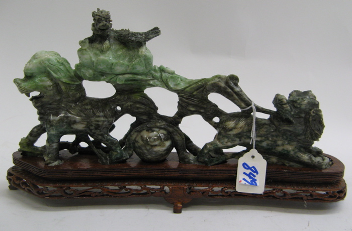 Appraisal: JADE CARVED FIGURAL GROUP foo lions at either end with