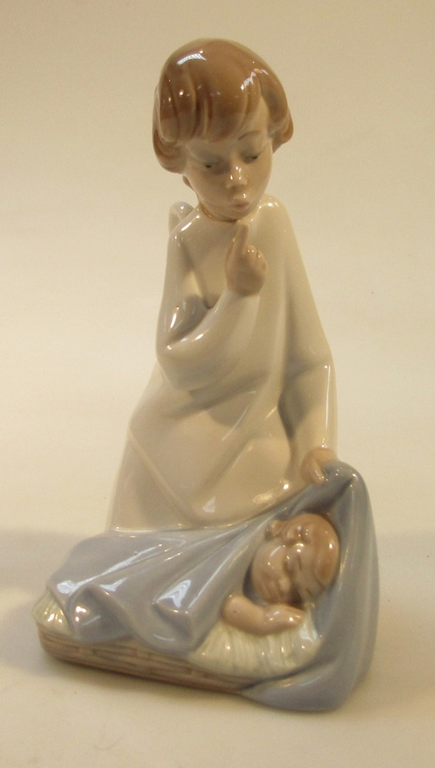 Appraisal: A thC Lladro figure of a girl aside baby he