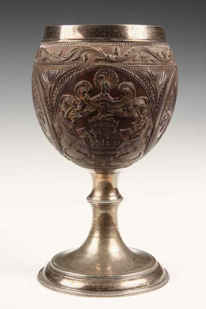 Appraisal: ENGLISH SILVER MOUNTED CARVED COCONUT CHALICE - Sailor Carved Coconut