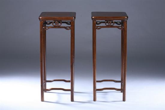 Appraisal: PAIR CHINESE WALNUT STANDS Square top above circular legs joined