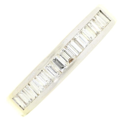 Appraisal: A diamond ring with nine baguette cut diamonds in white