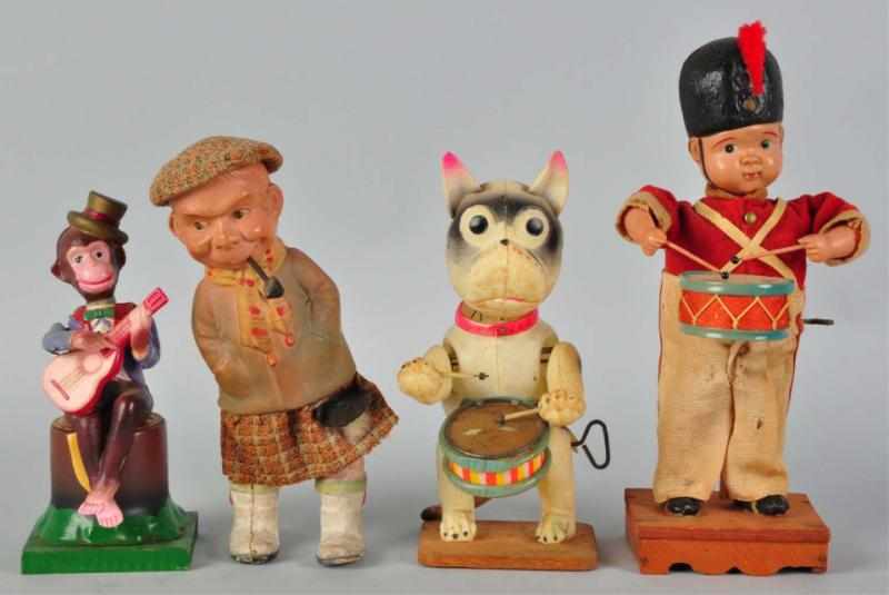 Appraisal: Lot of Celluloid Figural Wind-Up Toys Japanese Working Includes one