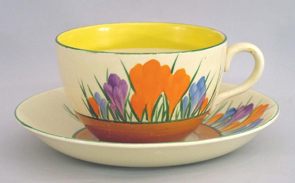 Appraisal: Autumn Crocus' Bizarre globe teacup and saucer