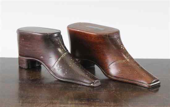 Appraisal: Two th century French walnut shoe shaped snuff boxes largest