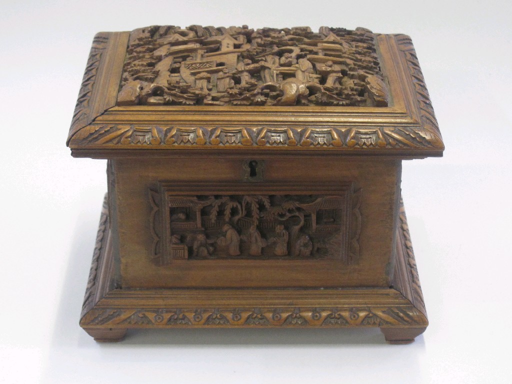 Appraisal: Chinese wooden box with intricately carved panels with figures in