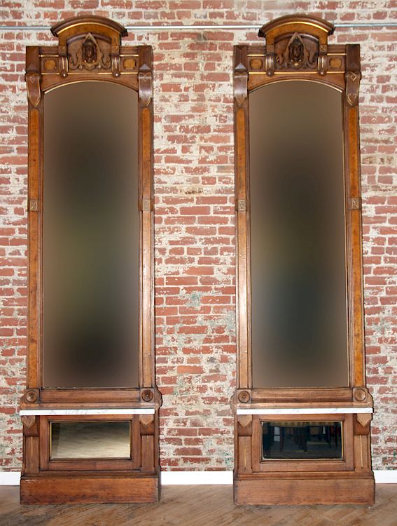 Appraisal: RARE PAIR OF CARVED WALNUT MIRRORS C A rare pair