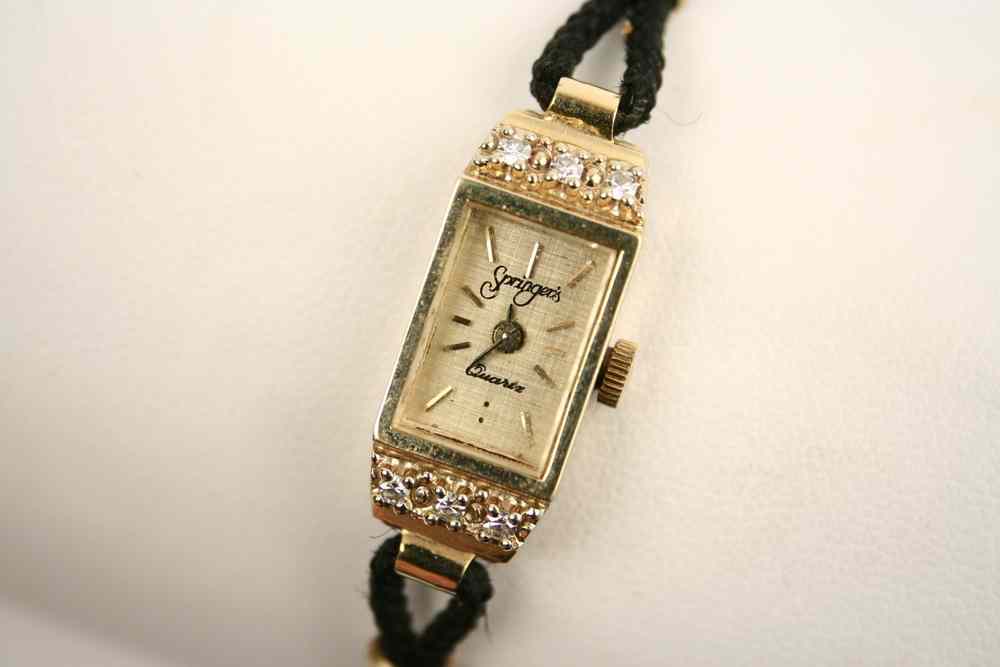 Appraisal: LADY'S WRISTWATCH - K yellow gold and diamond watch signed