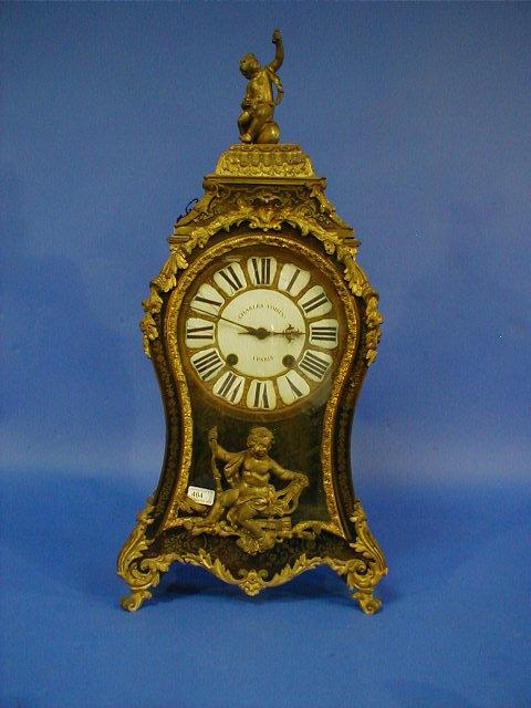 Appraisal: A fine Boulle and ormolu mounted bracket clock the enamel