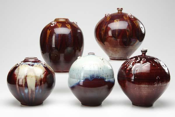 Appraisal: TOM TURNER Five porcelain vessels two covered in oxblood with