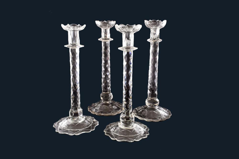 Appraisal: SET OF FOUR IRISH CUT-GLASS CANDELSTICKS th Century Each with