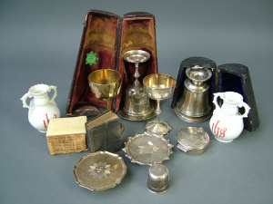 Appraisal: A Victorian silver cased travelling communion set London comprising of