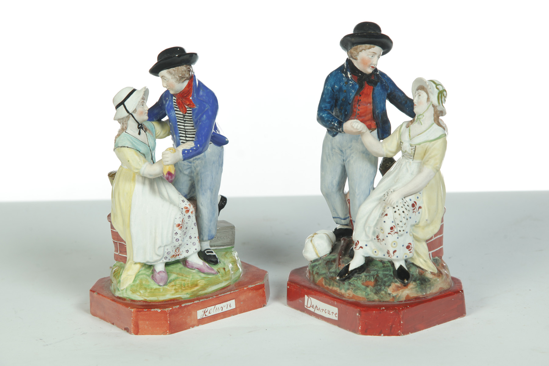 Appraisal: TWO EARLY STAFFORDSHIRE FIGURINES DEPARTURE AND RETURN England st quarter-