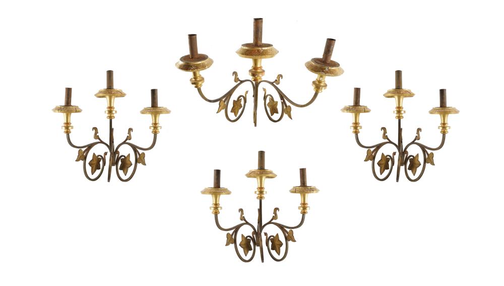 Appraisal: FOUR THREE-LIGHT WALL SCONCESgilt-painted iron and wood Condition with loss