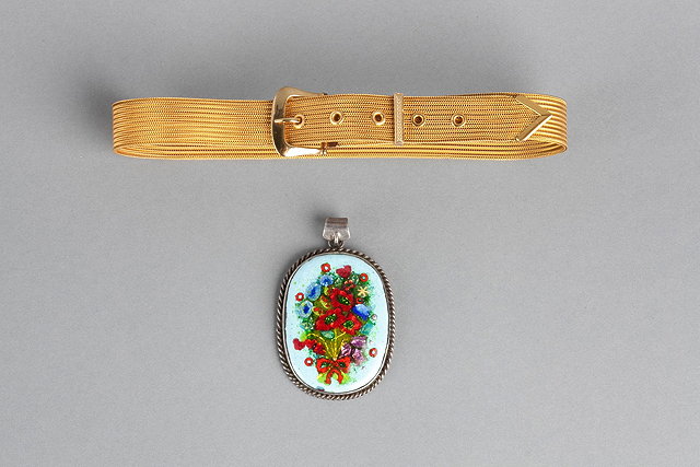 Appraisal: A SCANDINAVIAN SILVER AND ENAMEL PENDANT decorated with a bouquet