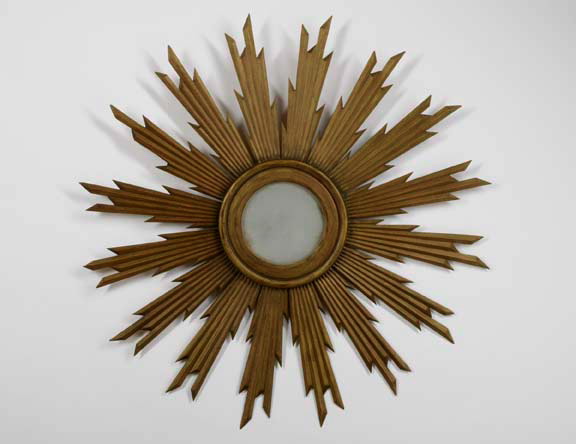 Appraisal: Italian Carved Giltwood Sunburst Looking Glass in the Directoire style