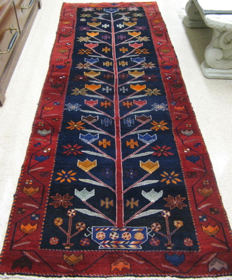 Appraisal: PERSIAN ZANJAN RUNNER colorful single tree design with stylized flower