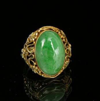 Appraisal: A Jade Cabochon in Fancy Gold Setting k yellow gold