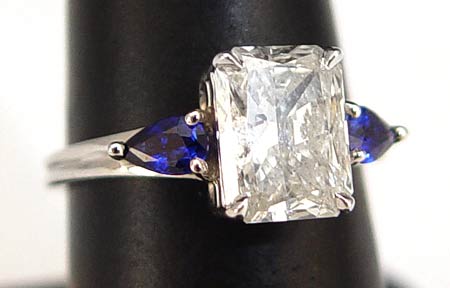 Appraisal: CT RECTANGULAR RADIANT DIAMOND RING With SAPPHIRES Approx diamond cut