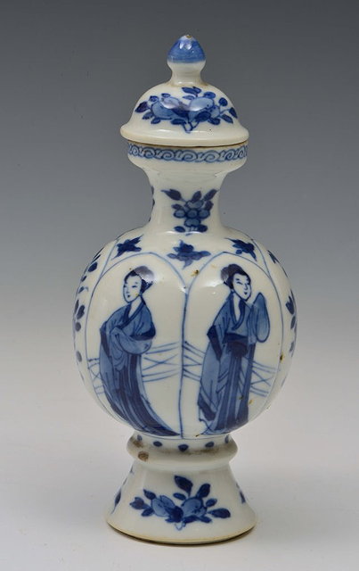 Appraisal: A CHINESE SMALL PORCELAIN VASE with panels of figures and