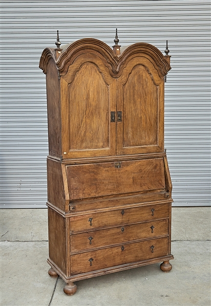 Appraisal: Tall two-section secretary desk and cabinet with numerous drawers and