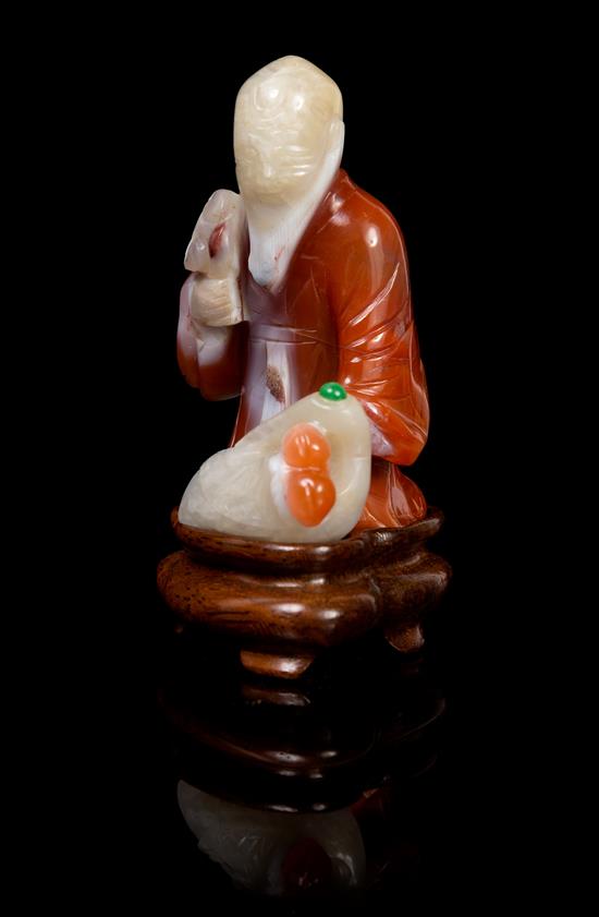 Appraisal: Sale Lot A Chinese Carnelian Agate Figure of Shoulao With