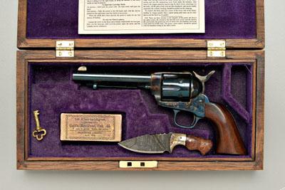 Appraisal: Miniature Colt revolver dagger single-action army revolver original case colors