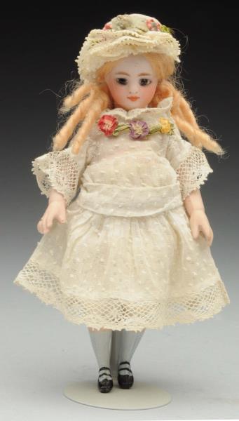 Appraisal: Lovely All-Bisque Mignonnette Doll French all-bisque with swivel neck light