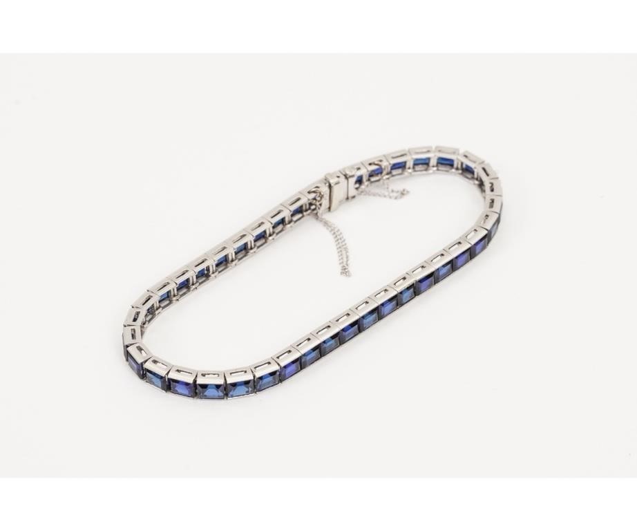 Appraisal: Ladies platinum and sapphire channel set bracelet grams with stones