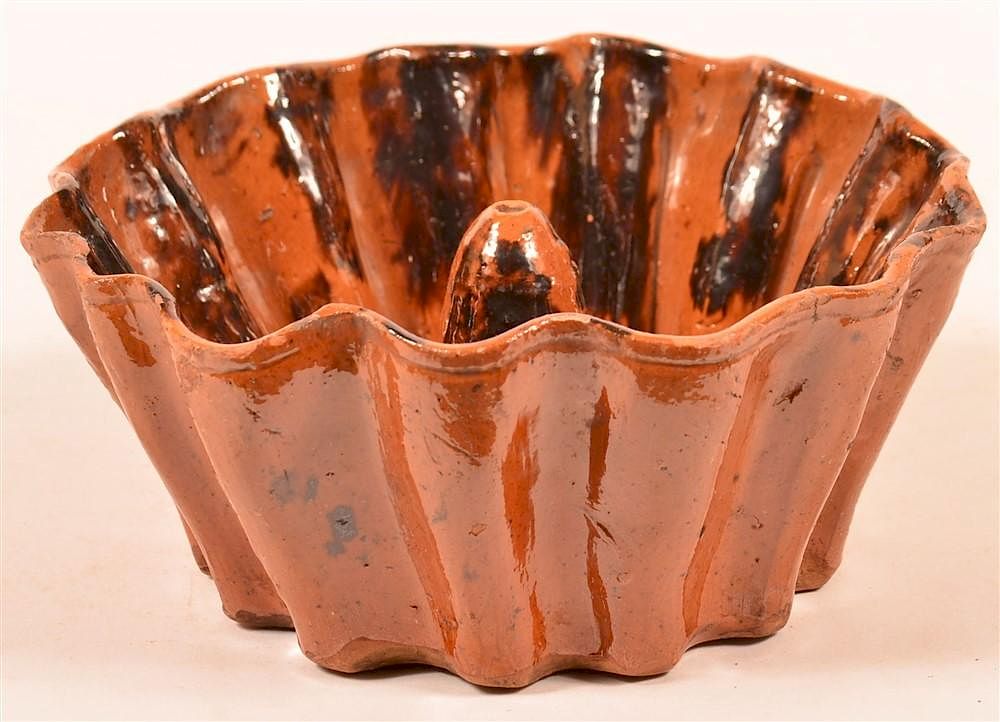 Appraisal: Mottle Glazed Redware Scallop Edge Turks Mold Mottle Glazed Redware