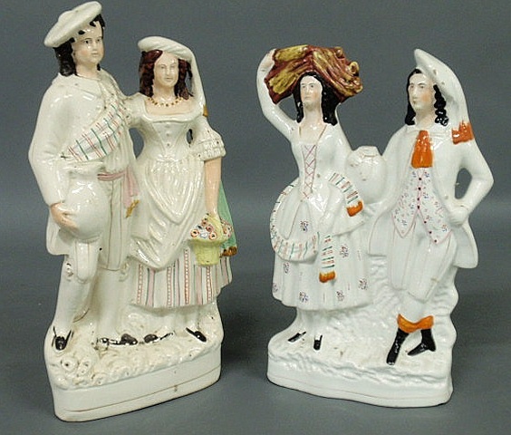 Appraisal: Two Staffordshire figural groups of men and women c each