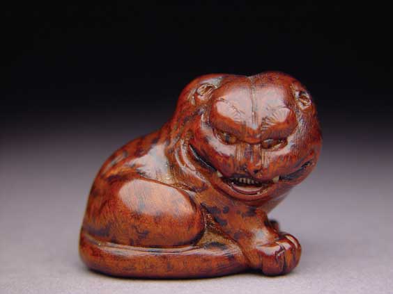 Appraisal: ANTIQUE WOOD NETSUKE Antique and well carved wood netsuke of