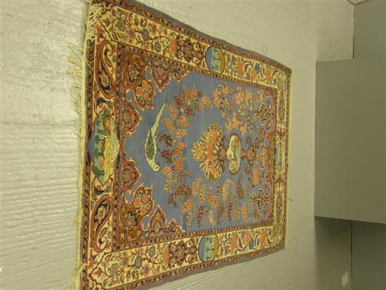 Appraisal: th Century blue-ground rug with main cream border with four