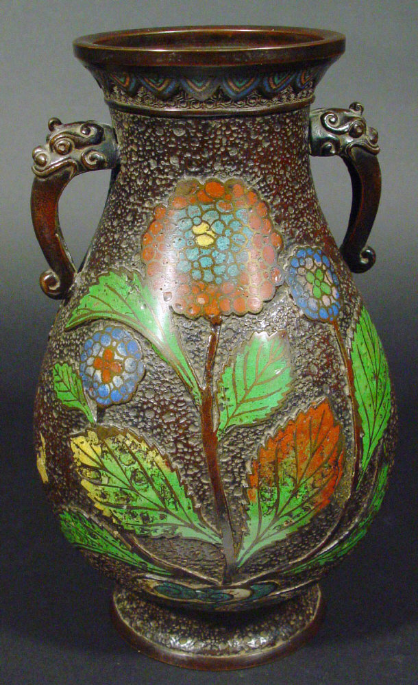 Appraisal: Large Japanese enamelled bronze vase cast in relief with flowers