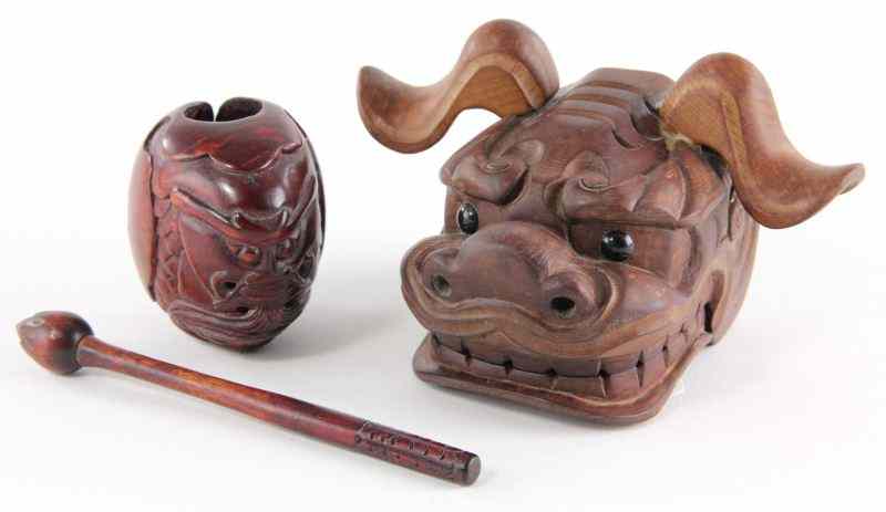 Appraisal: Two Asian Wood Carvingsthe first a Japanese noise maker the