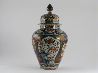 Appraisal: A Japanese Imari vase and cover typically decorated with panels