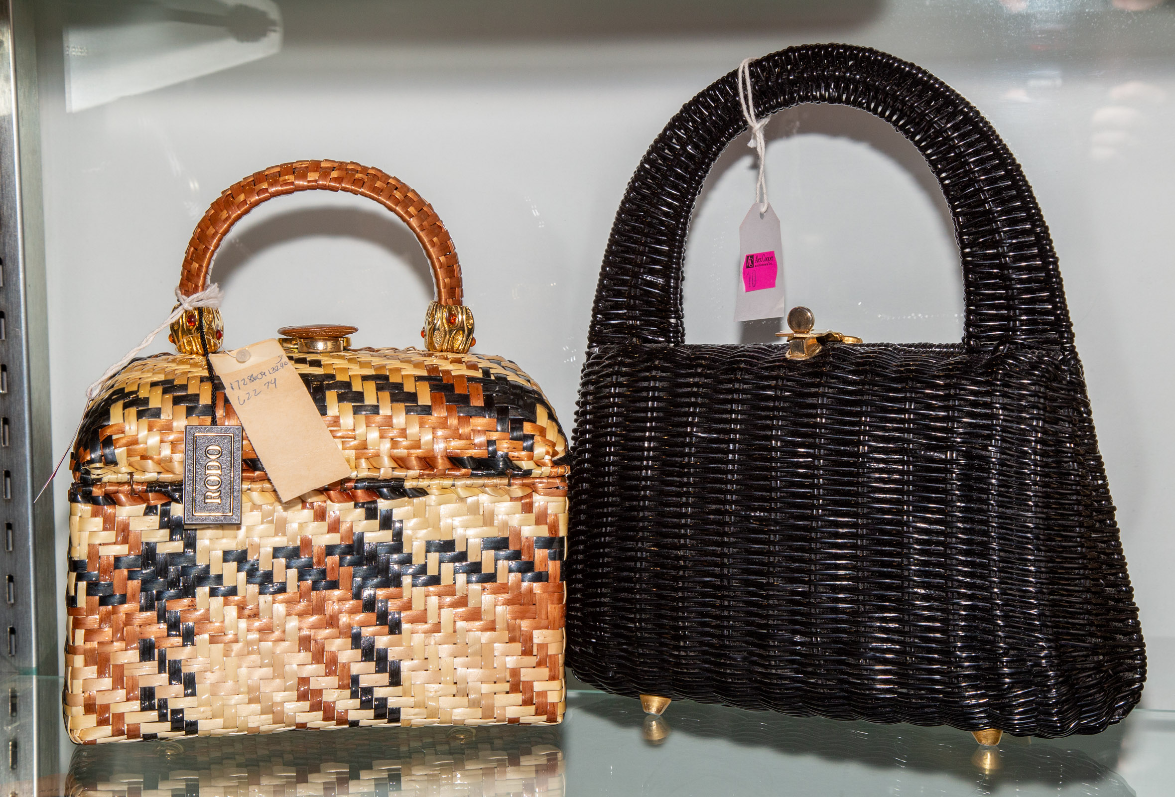 Appraisal: TWO VINTAGE STRAW WICKER HANDBAGS including a Rodo woven straw