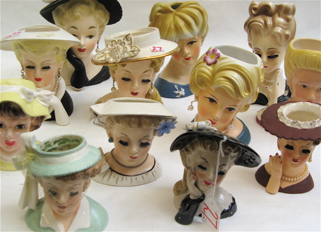 Appraisal: COLLECTION OF TWENTY-ONE PORCELAIN HEAD VASES variety of ladies head