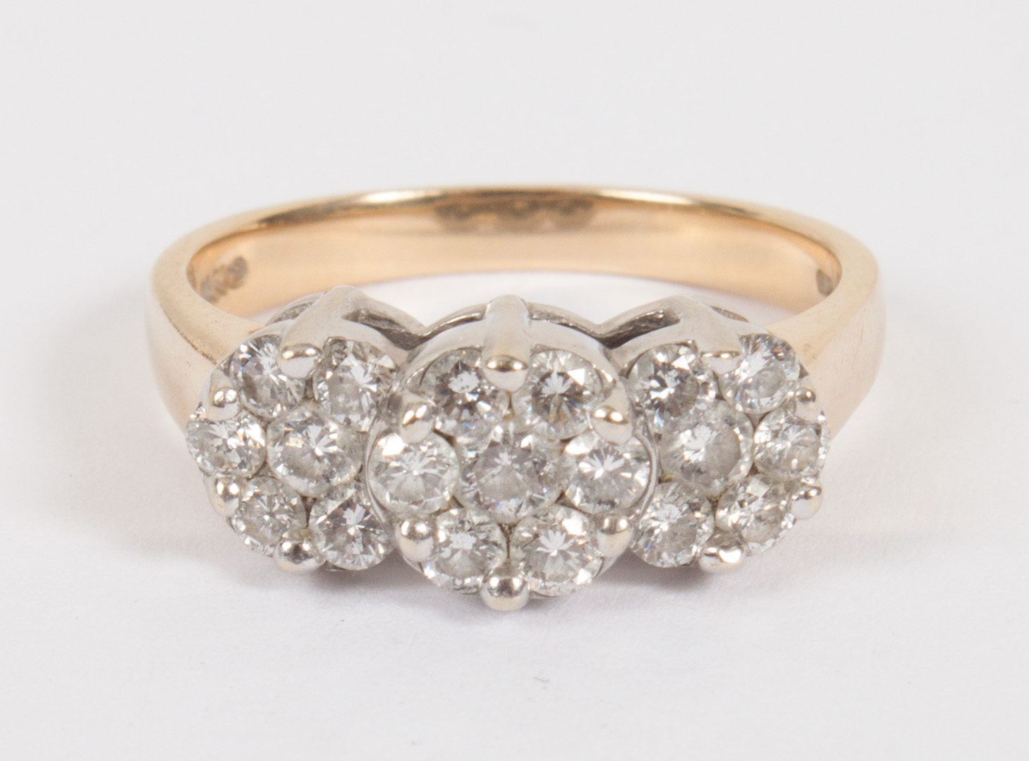 Appraisal: Lady's K gold diamond ring presenting three clusters of diamond