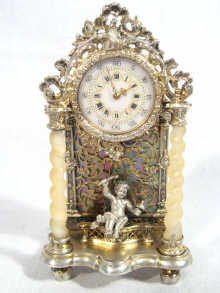 Appraisal: A silver and mother of pearl miniature clock the fretted