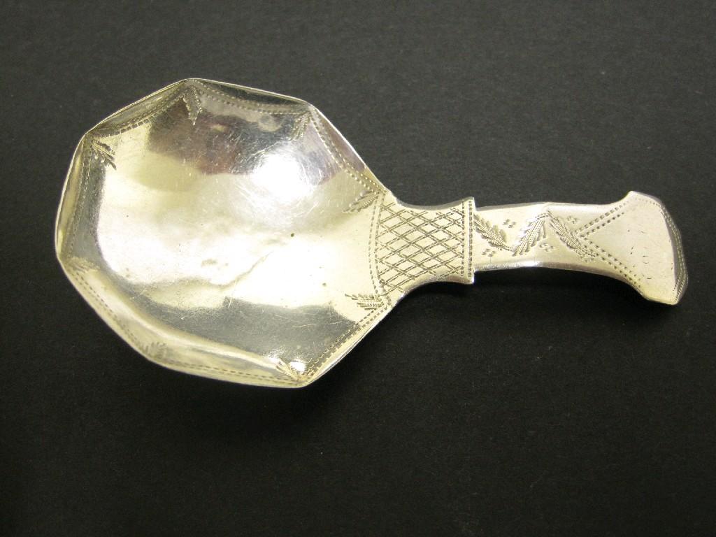 Appraisal: A George III Caddy Spoon with octagonal bowl bright cut