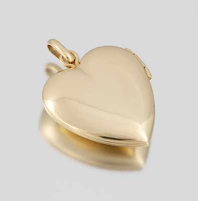 Appraisal: A Ladies' Gold Heart Locket Stamped T Co k yellow