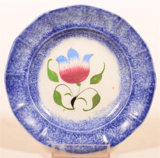 Appraisal: Blue Spatter Tulip Pattern Cup Plate Blue Spatter Ironstone China