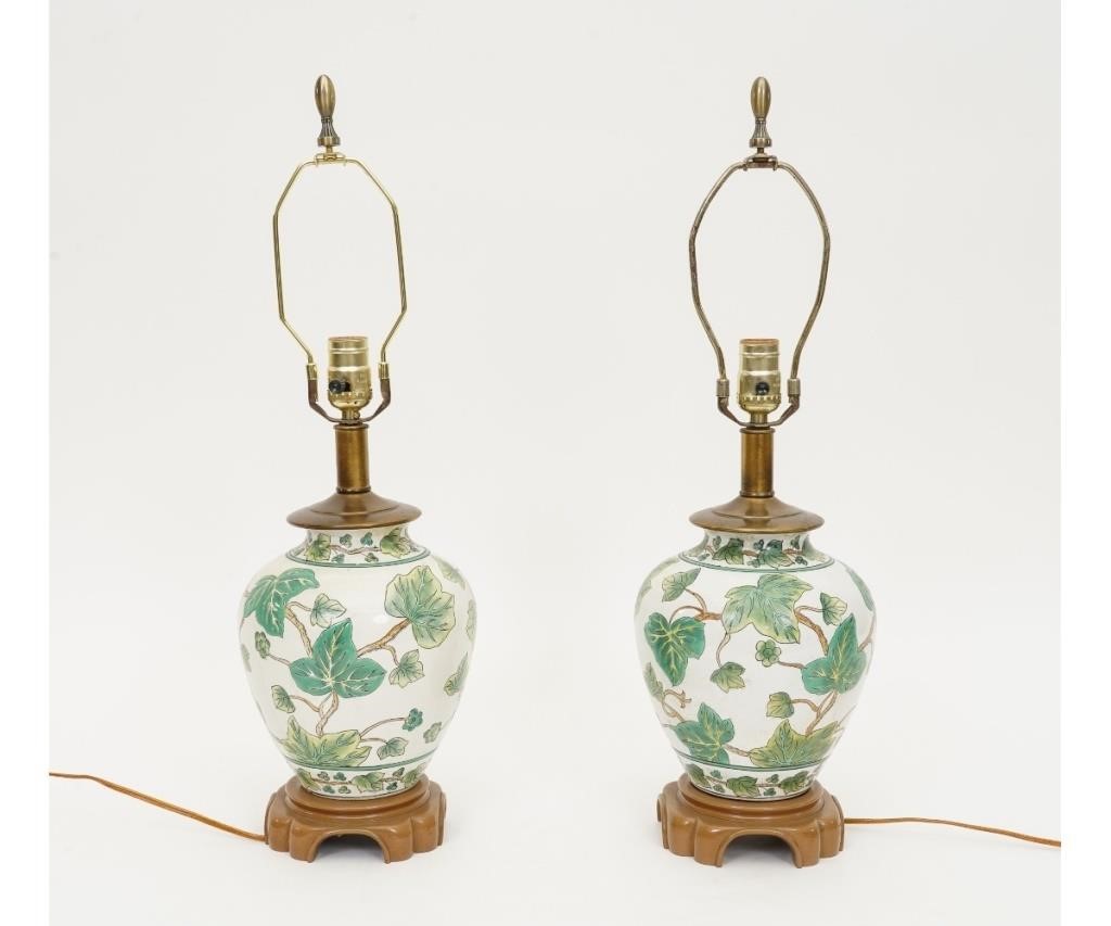 Appraisal: Pair of Asian style contemporary porcelain table lamps with wood