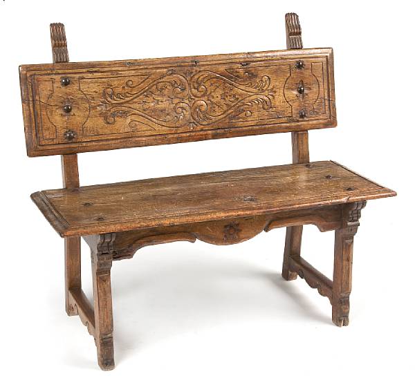 Appraisal: A carved hardwood bench height in width in depth in