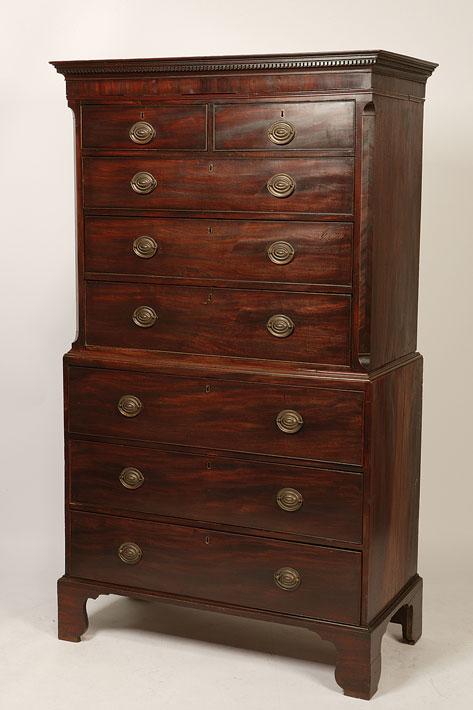 Appraisal: A GEORGE III SECRETAIRE CHEST ON CHEST the upper section