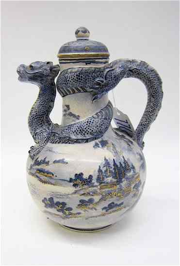 Appraisal: JAPANESE SATSUMA POTTERY TEAPOT with figural dragon as handle and