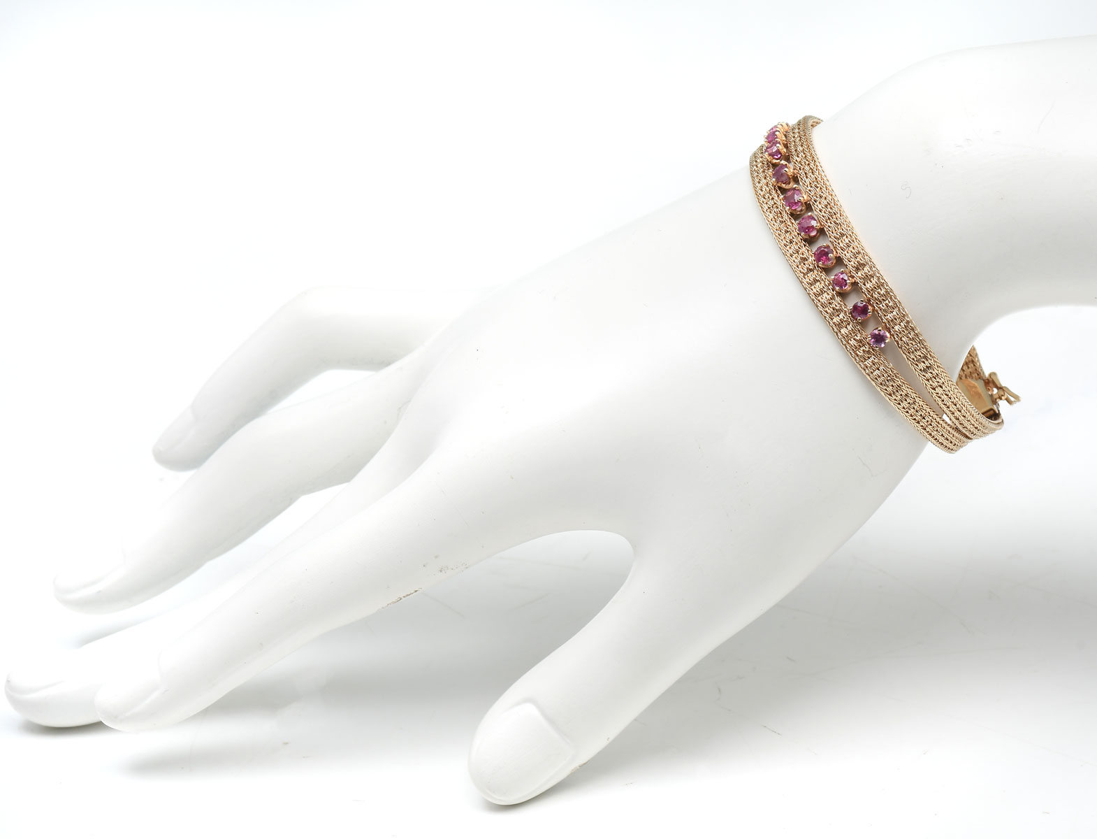 Appraisal: K PINK SAPPHIRE BRACELET K yellow gold bracelet contains round