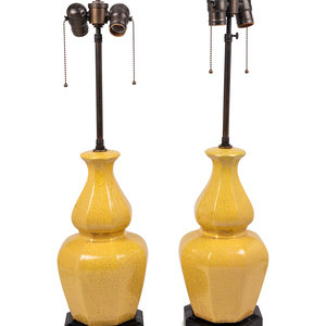 Appraisal: A Pair of Yellow Glazed Pottery Lamps Height inches Property