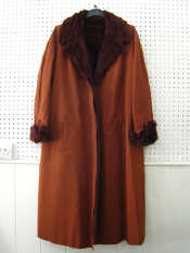 Appraisal: A full length Russian Ermine fur lined rain coat Fur